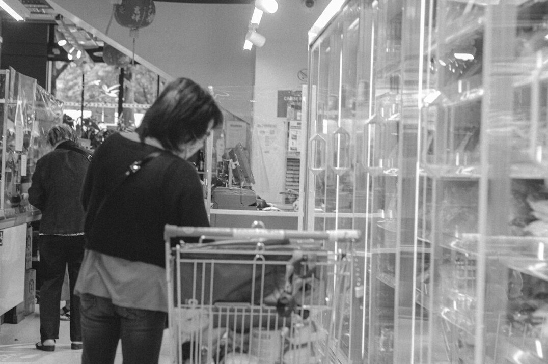 store security guard watching monitors