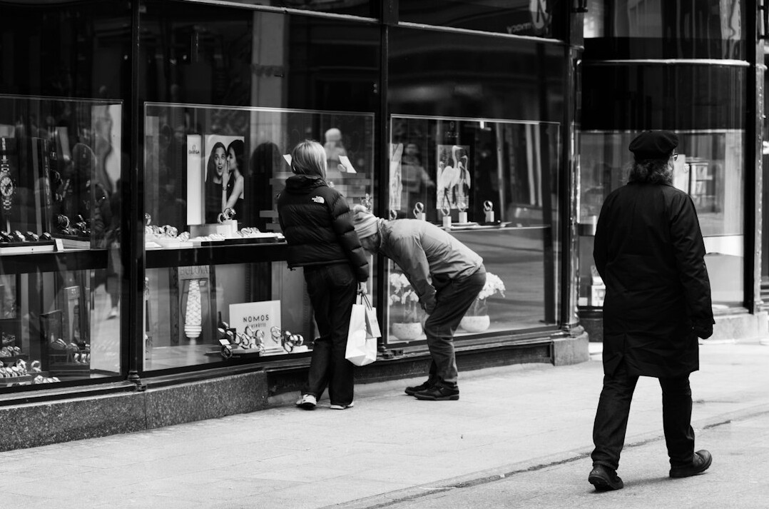store detective observing shoppers