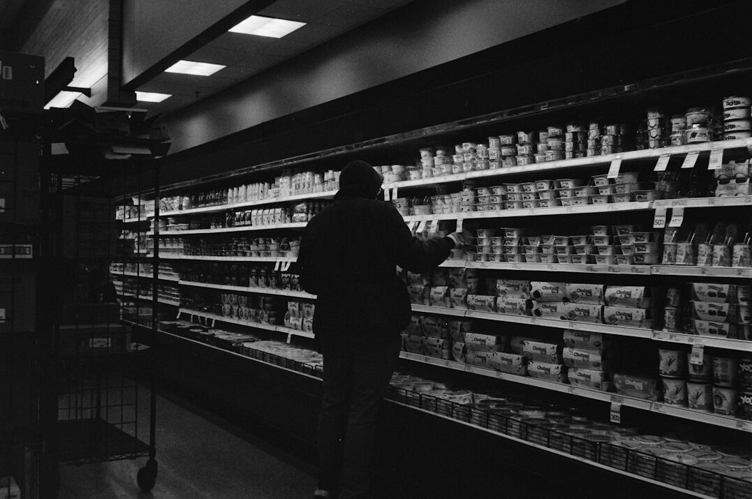 supermarket security guard observing