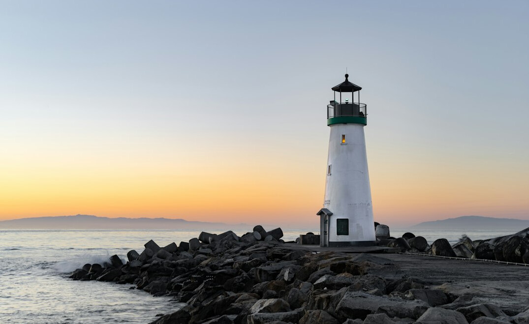 Foggy lighthouse at dusk near Punta del Este, Uruguay