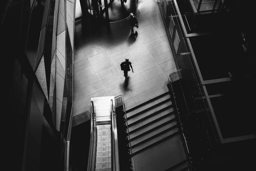 detective interviewing suspect in mall